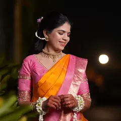 A beautiful candid portrait of the bride during her Haldi ceremony. The soft evening light and natural smile make for a perfect shot.