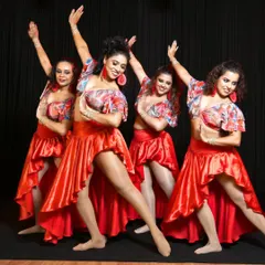 Our amazing LDI ladies team in their stunning red costumes. In the dance of sisterhood, we find strength, joy, and the magic that happens when women come together to create something beautiful.
