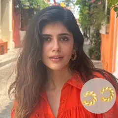 The lovely Sanjana Sanghi looking absolutely radiant in my Braided Beauty Hoops. These chunky, twisted gold hoops are the perfect accessory to make any outfit pop.