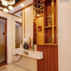 A modern foyer design with a floating console, CNC-cut paneling, and a decorative shelf, creating a stylish and welcoming first impression.