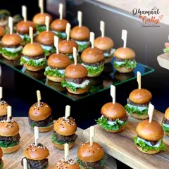 A glimpse of my diverse culinary offerings. From gourmet mini burgers to classic Indian dishes, I am your one stop solution for all catering needs.