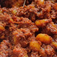 A close-up of my spicy and tangy Prawns pickle. Each prawn is cleaned thoroughly and cooked to perfection, soaking up all the flavors of the masala.