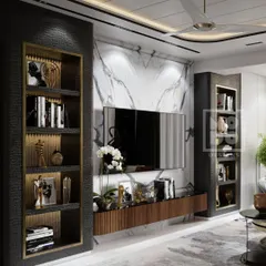 Modern luxury at its finest. This living room showcases a perfect harmony of textures and tones, with black textured shelving, golden highlights, and a stunning marble backdrop for a timeless, elegant vibe.