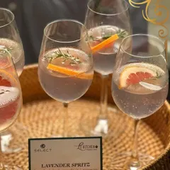 A sophisticated Lavender Spritz, infused with fresh grapefruit and rosemary for a unique and aromatic flavour profile.