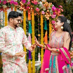 A candid dance moment, capturing the fun and festive mood of the Haldi celebration.