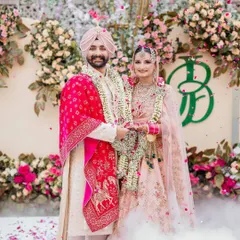 Seeing a bespoke monogram come to life is a magical moment. Here, the 'JB' emblem I designed is beautifully integrated into the floral backdrop of a stunning Amritsar wedding, creating a personal and elegant focal point for the couple's special day.