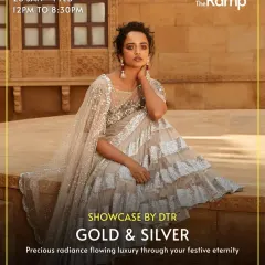 From our "Gold & Silver" showcase, this model wears a glamorous silver ruffled saree. It’s a modern take on the classic drape, perfect for receptions and cocktail parties.