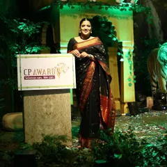 Posing on the jungle-themed stage for the AstraZeneca Country President Awards in Udaipur. This event recognized innovation and impact in healthcare.
