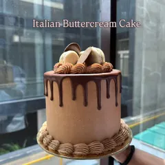 An Italian Buttercream Cake with a rich chocolate drip and macarons. This was another beautiful creation from my classical cakes week at pastry school.