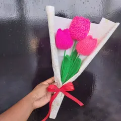 A beautiful bouquet of three bright pink crochet tulips. Tulips are one of my favorite flowers to make, and they look so elegant in any setting.