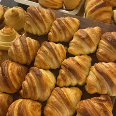 A beautiful spread of freshly baked, flaky croissants. I believe in the importance of good bread and pastry as part of a complete dining experience.