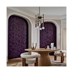 The 'ARCANE' collection features deep jewel colours in a plush velvet texture. This 3D geometric wallpaper is a showstopper, creating dramatic, sound-absorbing alcoves in this dining space.