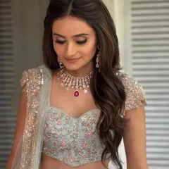A candid moment showing the beautiful flow of the soft waves. This hairstyle is perfect for brides who want a romantic and elegant look that feels effortless.