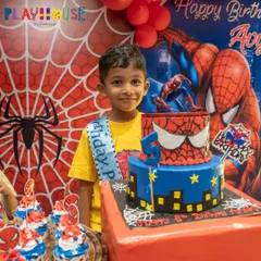 From the cake to the backdrop, I love bringing superhero dreams to life. Here, the birthday boy stands proudly with his amazing Spiderman-themed cake, ready for an action-packed celebration.