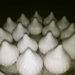 For Ganesh Chaturthi, our KitchenStars prepare traditional Ukadiche Modak. These steamed sweet dumplings, filled with coconut and jaggery, are a festive delicacy we are proud to offer, showcasing authentic Maharashtrian flavors.