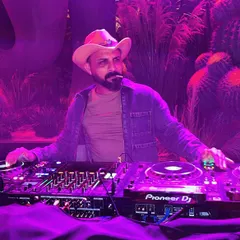 A stylized shot of me at a themed party, rocking a cowboy hat and enjoying the vibe. It's all about the attitude.
