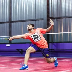A player mid-smash at our GOAT Vision launch event. Our courts are designed to support powerful, athletic movements, providing a safe and professional environment for competitive play.