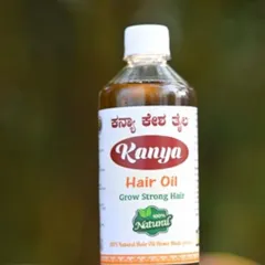 My Kanya Hair Oil bottle, ready to be used. I recommend warming the oil slightly before massaging it into your scalp for best results.