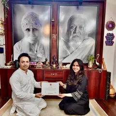 With my teacher, Arjun Sir, after receiving my certification. My teachers have been like my yoga parents, guiding me through every step, and it's this supportive lineage that I bring to my own students.