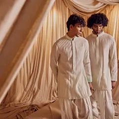 Grooming for two models in the Kunal Anil Tanna campaign. I ensured both models had a consistent, clean, and camera-ready look that complemented the light-colored ethnic wear.