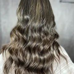 Another view of the ash blonde look, showing the seamless integration of cool tones.