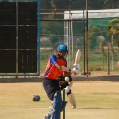 An ODI match in full swing. Here, one of our batsmen is focused at the crease, ready to build an innings and put pressure on the opposition.