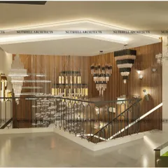 The staircase itself is a gallery for statement lighting. We used a backdrop of fluted wood paneling to create a warm and sophisticated canvas for displaying a variety of dramatic and artistic fixtures.