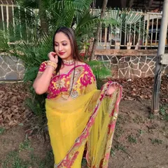 A beautiful client looking radiant in a yellow designer saree, with rentals starting at just ₹500.