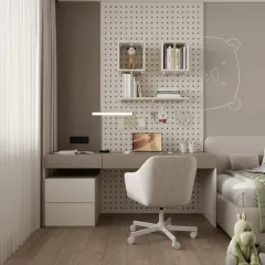 This study nook combines function and style with a pegboard wall for modular shelving. The minimalist desk and drawers are integrated next to the bed, making it a perfect solution for a bedroom office.