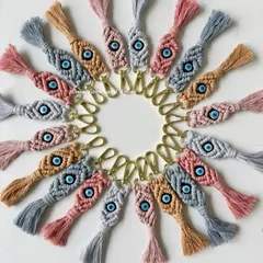 Perfect for bulk orders, these macrame evil eye keychains are a popular choice for return gifts. I make them in a variety of soft, beautiful colors, so you can pick the perfect palette to match your event's theme.