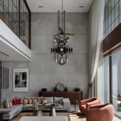 This large kinetic sculpture, featured in Architectural Digest, was a commission for a home with soaring ceilings. The piece is composed of interlocking shapes and forms, designed to draw the eye upward and fill the grand space.