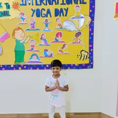 This little Aster is all smiles during our Yoga Day celebration. We believe a healthy body is key to a happy, active learner.