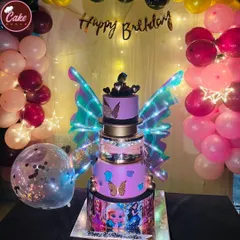 I love creating cakes that are not just delicious but also an experience. This video shows one of my popular electric butterfly wing cakes, where the wings light up and move, bringing an element of surprise and delight to the party.
