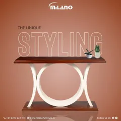 This console table showcases unique styling with its circular base and two-tone finish. It's a perfect statement piece for an entryway or hallway.