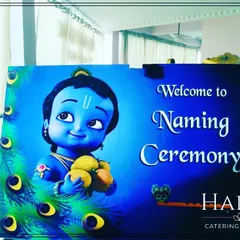 A welcome sign for a naming ceremony featuring an adorable illustration of baby Krishna. This adds a divine and welcoming touch for your guests at the entrance.