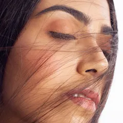 A soft and dreamy close up. This look focuses on a fresh, luminous complexion with minimal product, allowing the natural beauty of the skin to be the main feature.