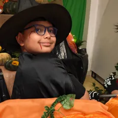 This young wizard is all dressed up and ready for our Halloween celebration. We love seeing the creativity and excitement that our festive events bring out in the children.
