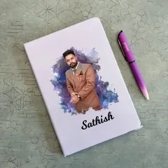 For a truly personal touch, I can print a full-color photo on the cover of a diary. This example shows a custom portrait and name, paired with a matching purple pen.