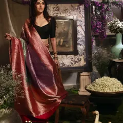 An artistic, full-length portrait for a handloom saree brand. We created a custom, rustic set within the studio to complement the traditional aesthetic of the collection, demonstrating our ability to build unique worlds for your brand.