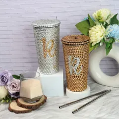Add some sparkle to your daily hydration with our personalized bling tumblers. Available in silver and gold finishes, these rhinestone-covered tumblers can be customized with a pearl-studded initial for that extra touch of glam.