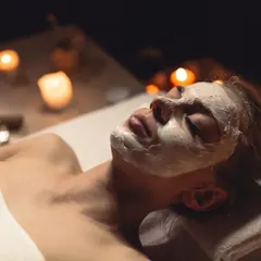 The warm, candlelit glow of our treatment rooms instantly calms the senses. This ambiance is an essential part of the healing experience we offer.