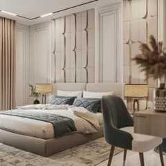We believe a bedroom should be a personal sanctuary. This space features a fully upholstered bed and a custom-paneled accent wall, creating a serene and sophisticated atmosphere that balances comfort with high-end design.