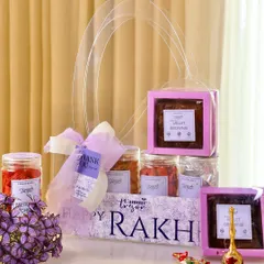 This is our healthy Rakhi hamper, designed to say 'I love you' and 'take care'. It's packed with wholesome, handcrafted treats like gluten free beetroot chips, ragi chips, and refined sugar free millet brownies.