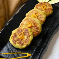 A delightful starter from our mango menu, the Khatti Mithi Tikki offers a perfect balance of sweet and tangy. These patties are a creative twist that celebrates the versatility of mango.