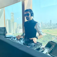 A sundowner session with the Mumbai skyline as the backdrop. I adapt my set for any environment, playing chill house and commercial pop that complements the sophisticated atmosphere of a daytime corporate event or private gathering.