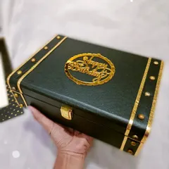 The box is part of the gift! I use these premium black and gold trunk boxes for a classic, reusable gift that feels luxurious from the moment they receive it.
