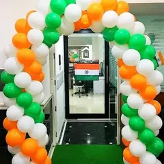 A tricolor balloon arch is a simple yet effective way to decorate an office entrance for Independence Day. This setup uses saffron, white, and green balloons to frame the doorway, creating a festive welcome for employees and visitors.