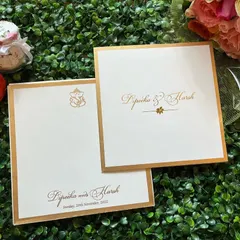 A classic and elegant invitation in white and gold. The simple border and beautiful script font create a timeless look.