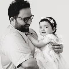A classic black and white portrait of a father and his baby girl. The bond between a dad and his child is so powerful, and monochrome images often capture that emotion perfectly.