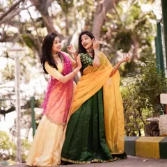 A candid moment with my sister during a photoshoot for our upcoming Kathak duet concert. We love sharing our passion and inviting audiences to our performances.
